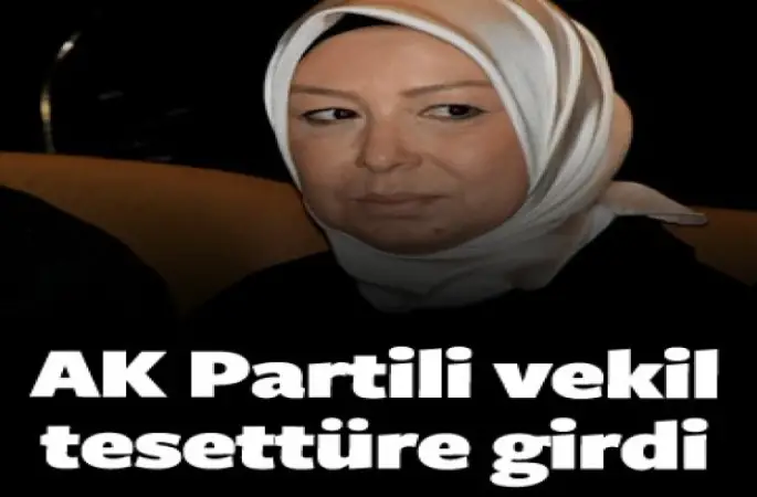 Umreden dönen AK Partili Çalık, başını örttü